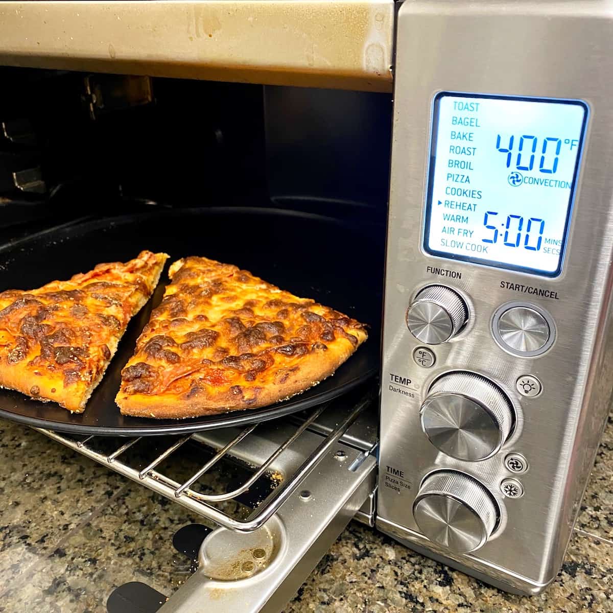 The Best Way To Warm Up Pizza Without Losing The Crunch