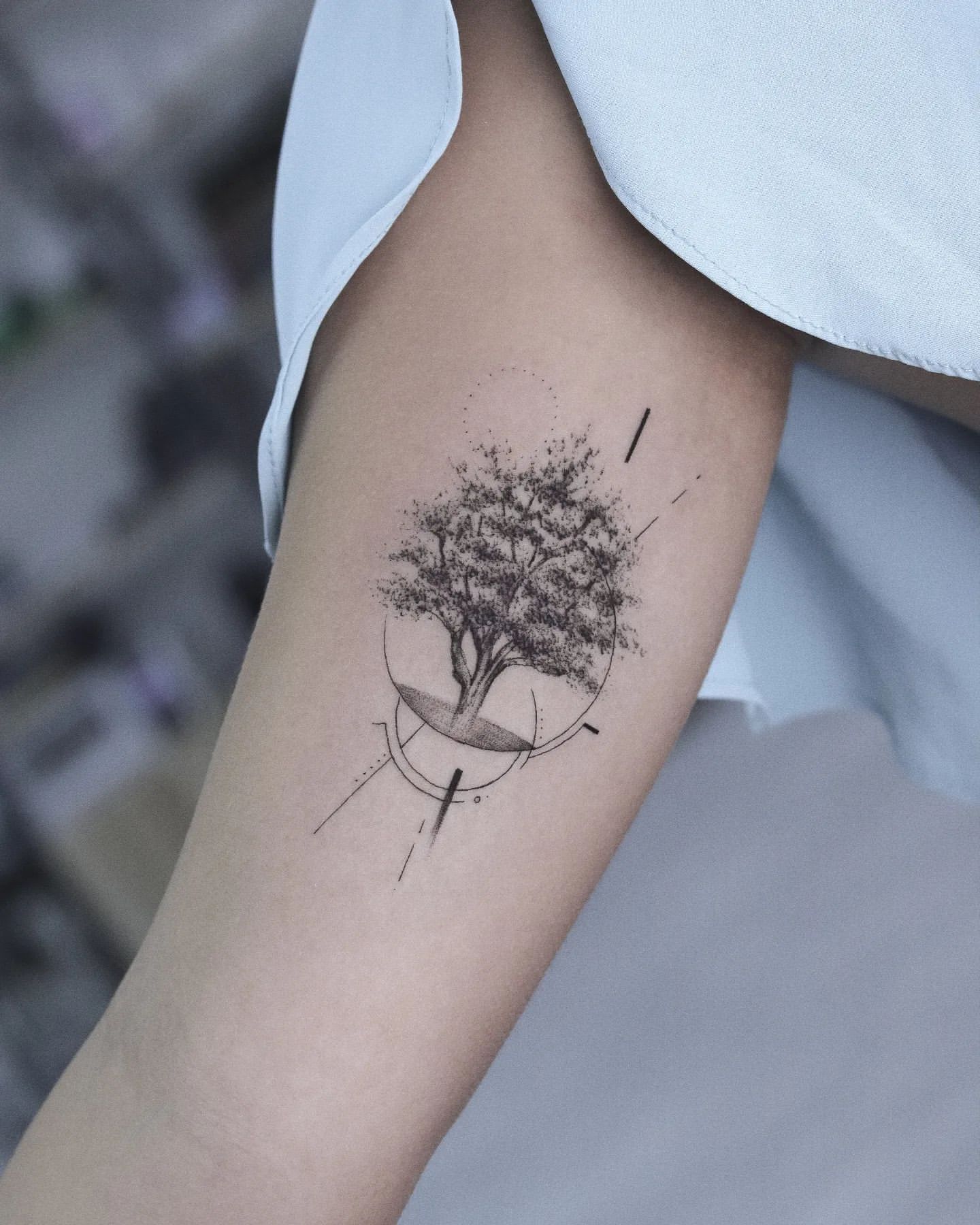 Decoding The Meaning Behind X’s Iconic Tree Tattoo